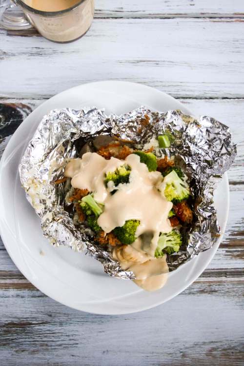 Baked Potatoes with Pulled Pork, Broccoli and cheese sauce.