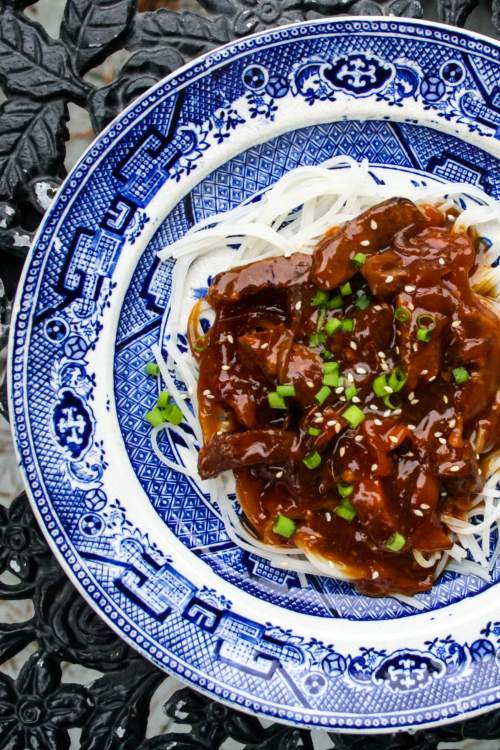 Crockpot Mongolian Beef - A rich and tangy Asian sauce with strips of beef and vegetables. WAY better than take-out!